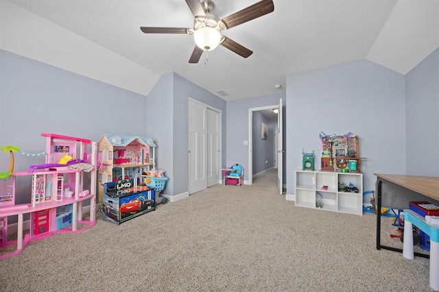 recreation room featuring carpet flooring, ceiling fan, and lofted ceiling