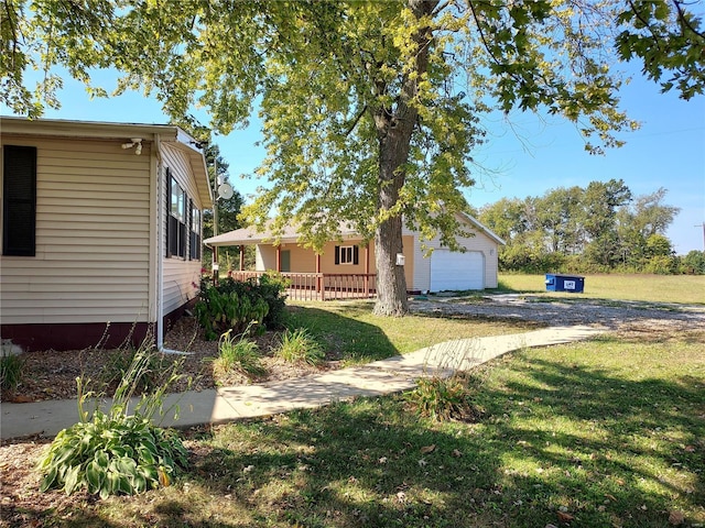 exterior space with a garage and covered porch