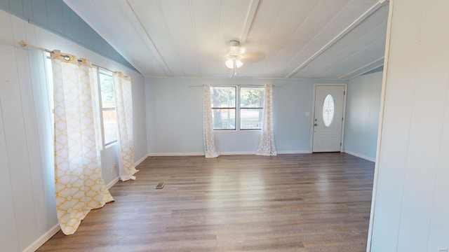 entryway with hardwood / wood-style flooring, ceiling fan, and lofted ceiling