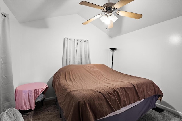 bedroom with carpet floors, ceiling fan, and lofted ceiling