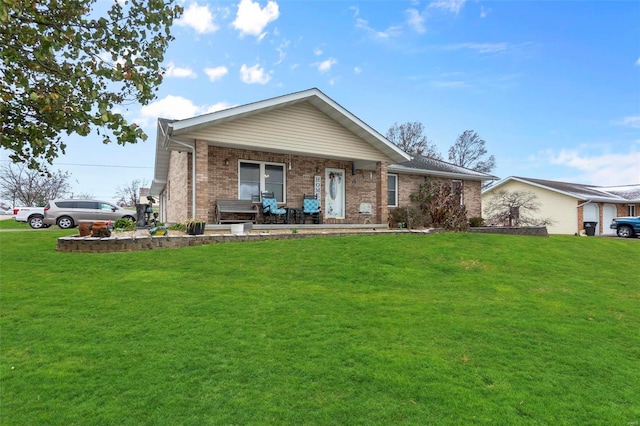 single story home with brick siding and a front lawn