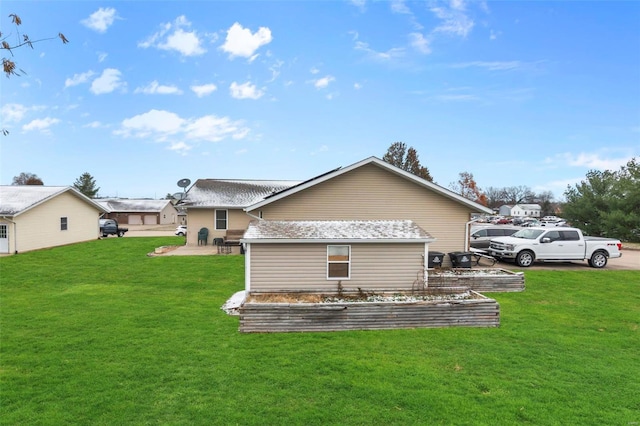 back of property featuring a yard and roof with shingles