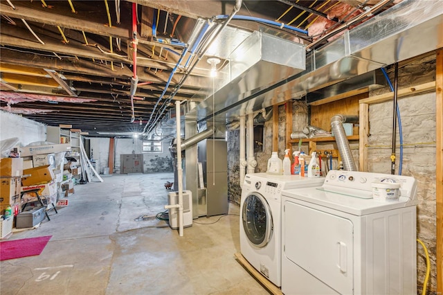 basement with separate washer and dryer