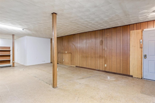 finished below grade area with wood walls