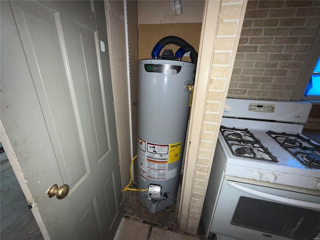 utility room with gas water heater