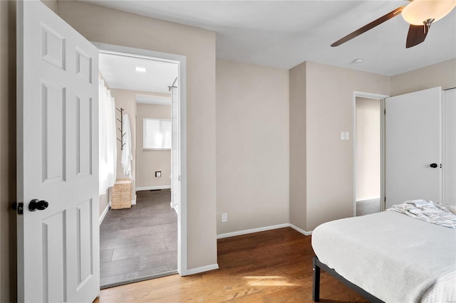 bedroom with ceiling fan and wood-type flooring