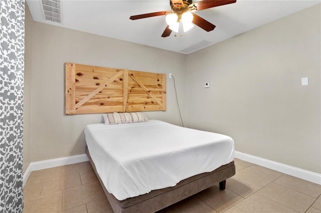 bedroom featuring tile patterned flooring and ceiling fan