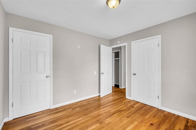 unfurnished bedroom with light hardwood / wood-style flooring