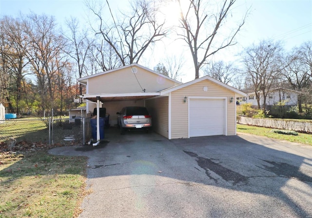 garage featuring a carport