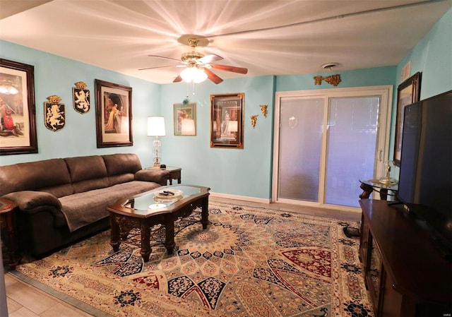 living room featuring ceiling fan