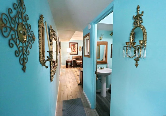 hallway featuring wood-type flooring