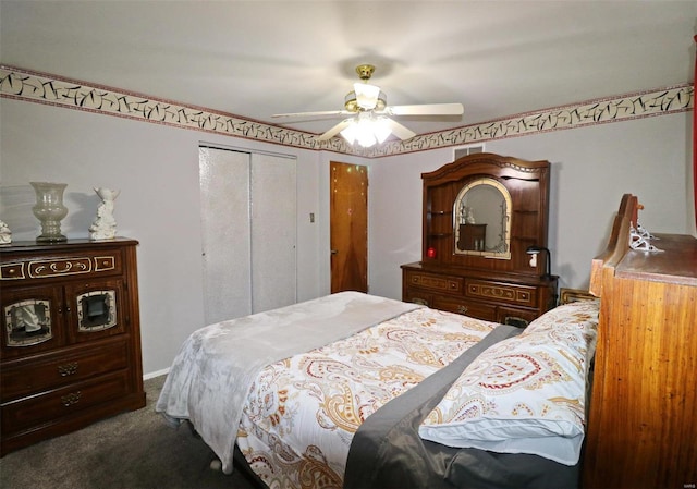 bedroom with ceiling fan, a closet, and dark colored carpet