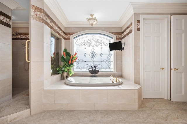 bathroom featuring tile patterned flooring, crown molding, and independent shower and bath