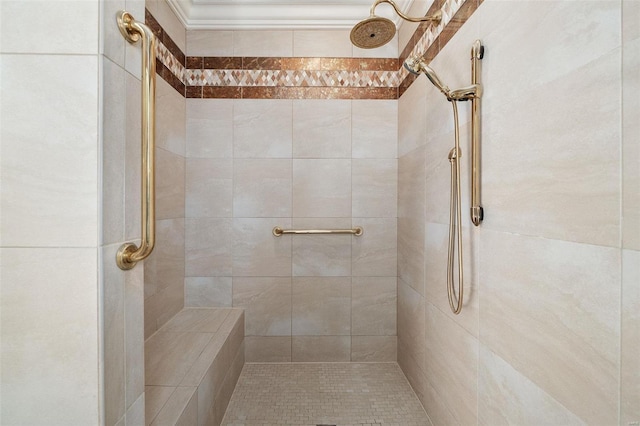 bathroom with a tile shower