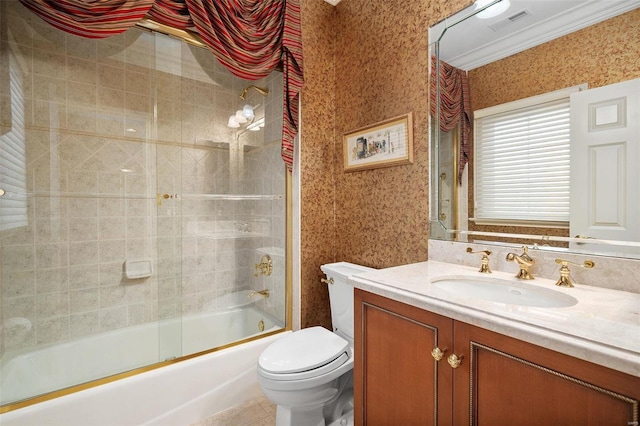 full bathroom featuring tile patterned flooring, vanity, enclosed tub / shower combo, and toilet