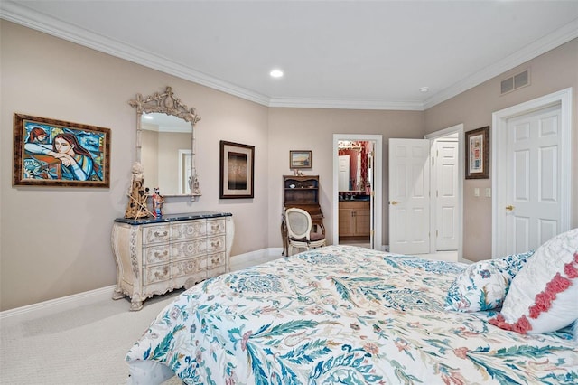 carpeted bedroom with crown molding and connected bathroom