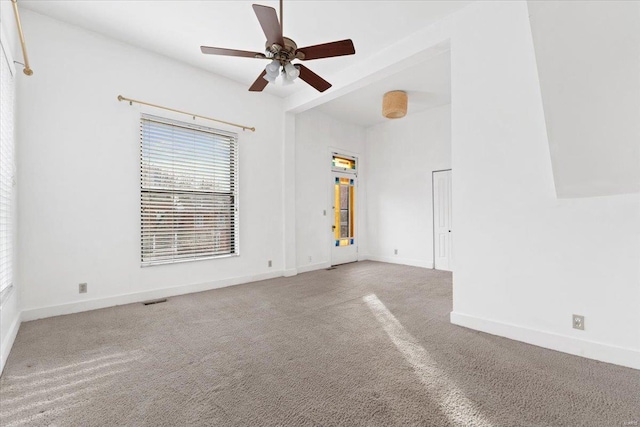 carpeted empty room with ceiling fan