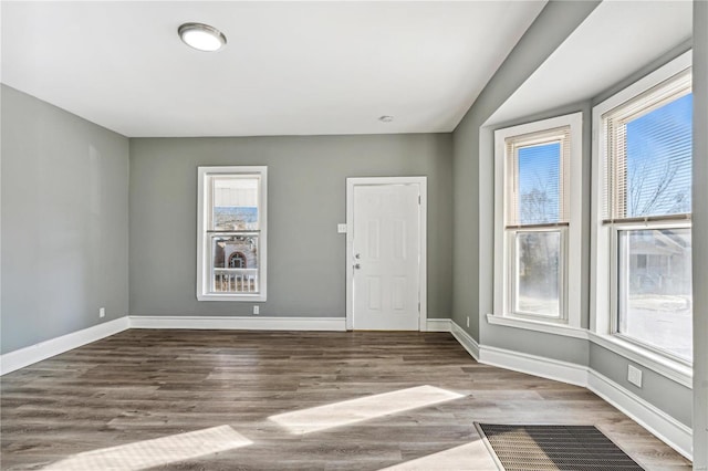 interior space with hardwood / wood-style floors