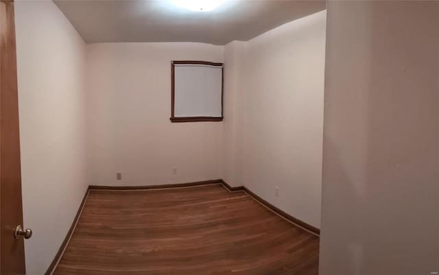 unfurnished room with hardwood / wood-style floors