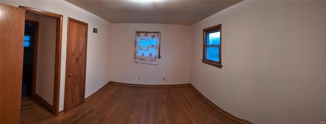 interior space with dark hardwood / wood-style flooring