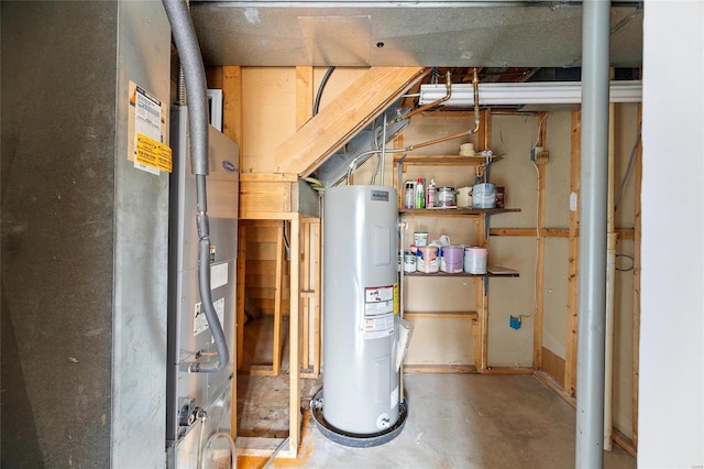 utility room with heating unit and electric water heater