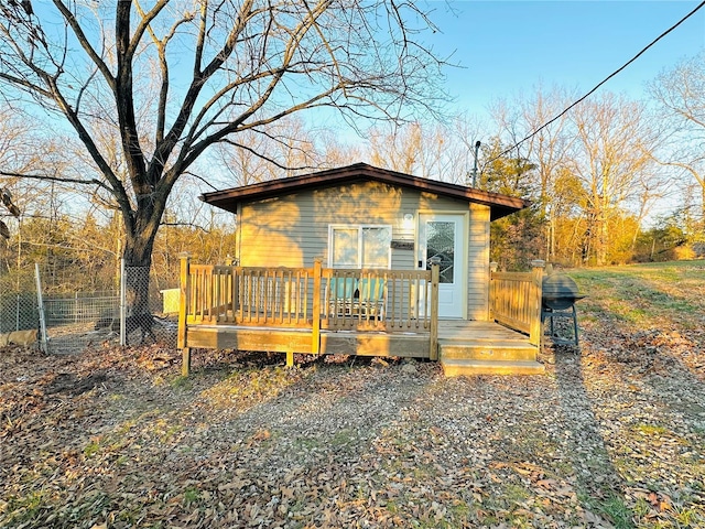 exterior space featuring a wooden deck