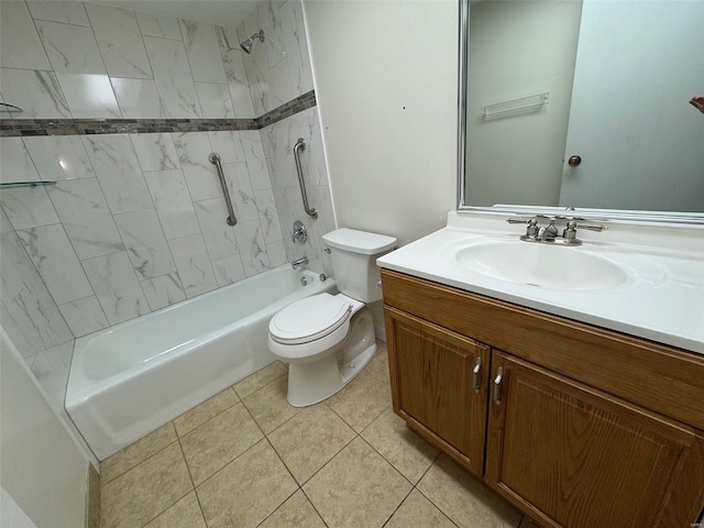 full bathroom featuring tile patterned floors, toilet, vanity, and tiled shower / bath