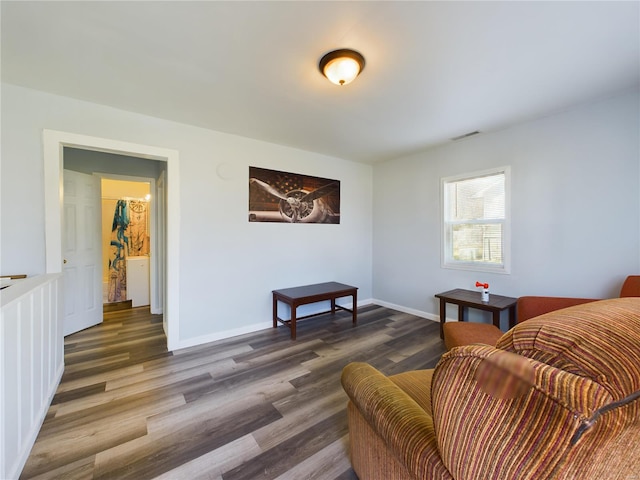 living room featuring dark hardwood / wood-style floors