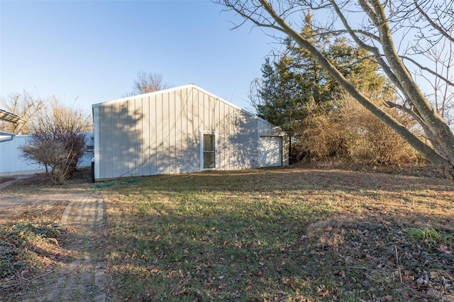 view of home's exterior with a yard