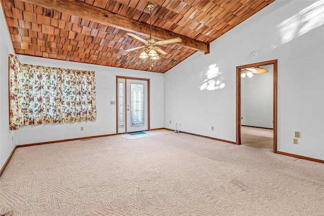 unfurnished room with vaulted ceiling with beams, ceiling fan, wooden ceiling, and light carpet