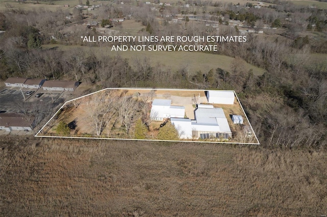 birds eye view of property featuring a rural view