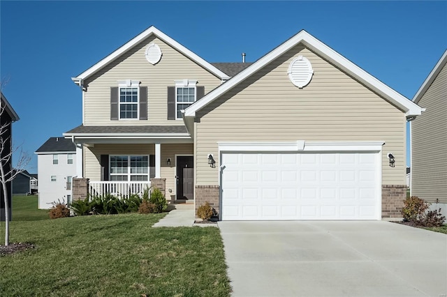 view of front of house featuring a garage, covered porch, and a front lawn