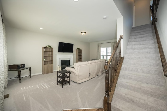 living room with light colored carpet