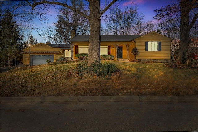 single story home featuring a garage