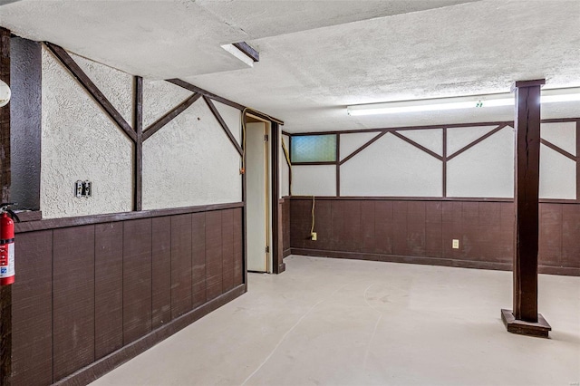 interior space with a textured ceiling