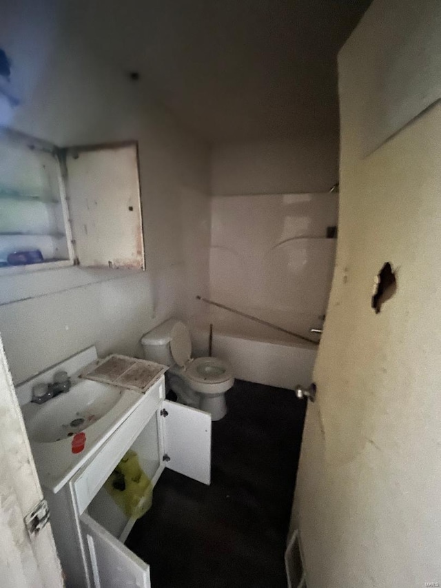 bathroom with toilet and sink