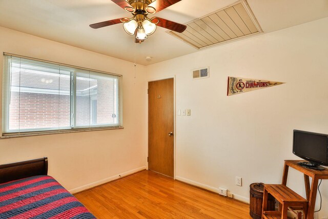 bedroom featuring ceiling fan and light hardwood / wood-style floors