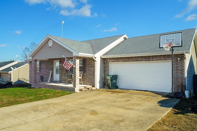 view of front of house featuring a garage and a front lawn