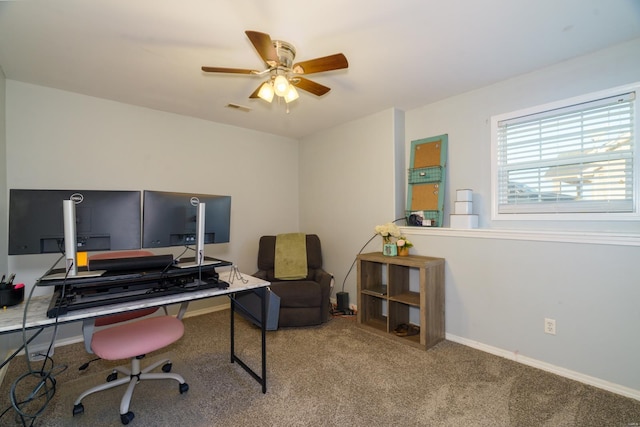 office area with carpet floors and ceiling fan