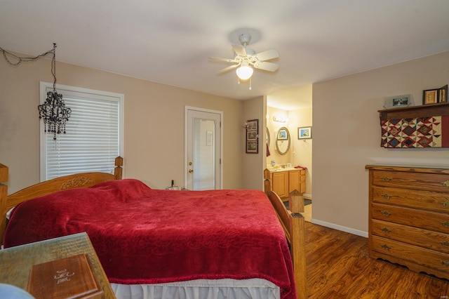 bedroom with hardwood / wood-style floors, ensuite bathroom, and ceiling fan