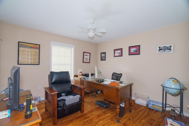 home office featuring hardwood / wood-style floors and ceiling fan