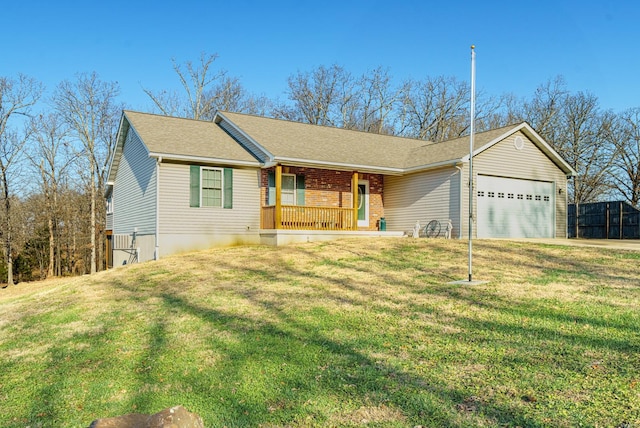 ranch-style home with a porch, a garage, and a front yard