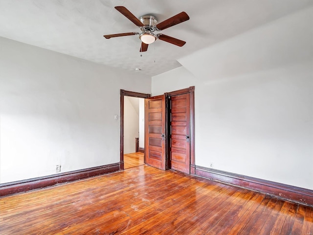 spare room featuring ceiling fan and light hardwood / wood-style floors