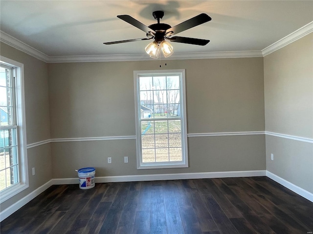 empty room with dark hardwood / wood-style flooring and a healthy amount of sunlight