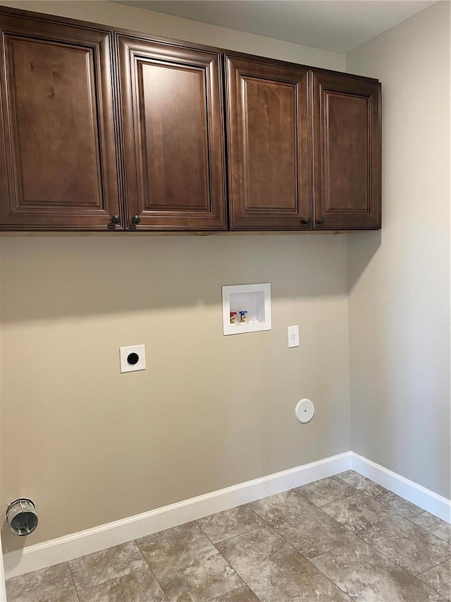 laundry area with washer hookup, electric dryer hookup, and cabinets