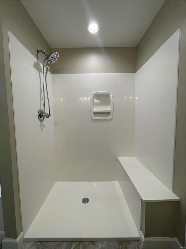 bathroom featuring walk in shower