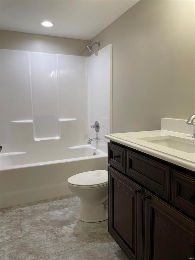 full bathroom featuring vanity, toilet, and shower / washtub combination