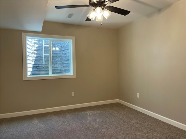 empty room with carpet flooring and ceiling fan