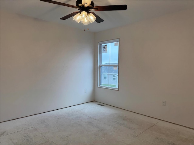 unfurnished room with ceiling fan