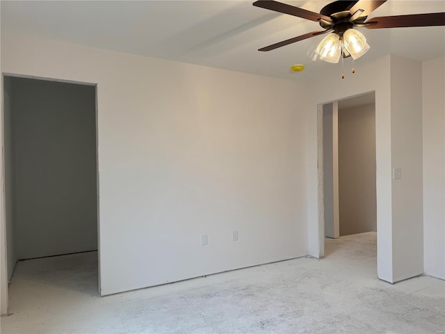 empty room featuring ceiling fan